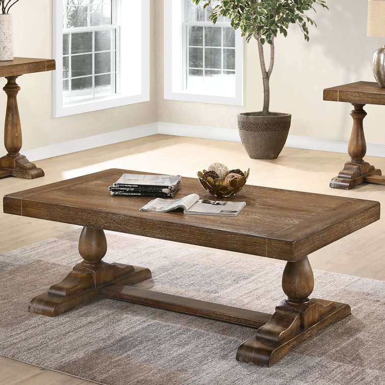 Wood trestle coffee table discount